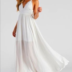 Beautiful white Windsor dress perfect for engagement pictures in beach